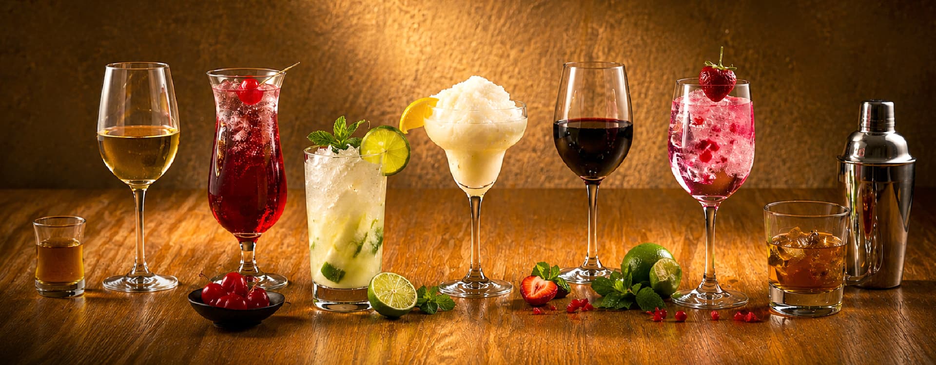 Premium whiskey served over ice beside a glass decanter on a polished wooden bar counter